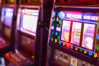 Mobile phone displaying jelas 777 live casino interface with game grid